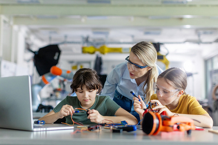 Students work together on a robotics project