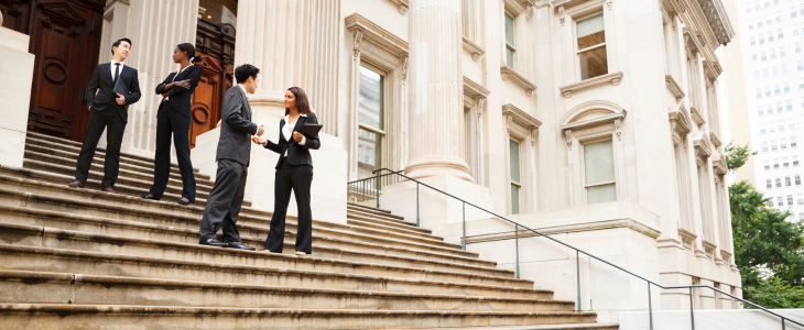 a government group on stairs