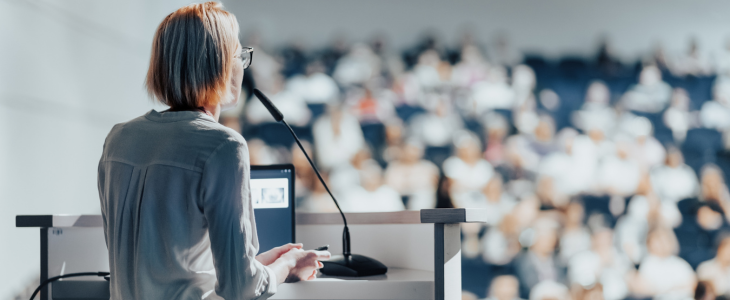 a speaker at a conference