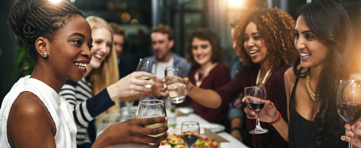 friends drinking at a winery